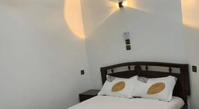 Вилла с балконом и с видом на сад Okpèyèmi guest house
