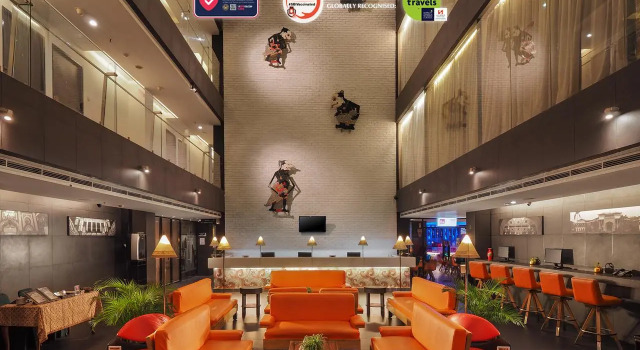 Кровать в общем номере Swiss-Belinn Medan