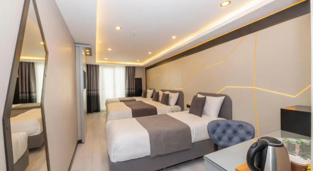 Четырёхместный номер Deluxe White Corner Hotel