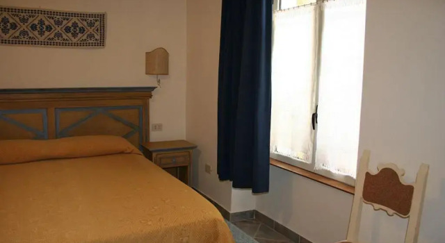 Camera a Dorgali al B&B Sa Madalena, Забронировать Отель «постель и завтрак» Отели Залива Орозеи с парковкой, Парковка