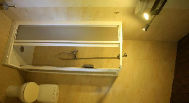 Кровать в общем номере Casa Barbadelo