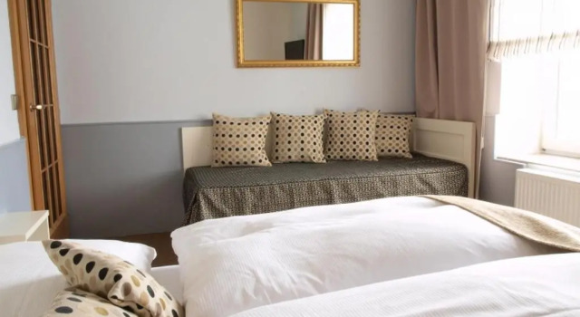 Standardowy trzyosobowy pokój Hotel Golfi