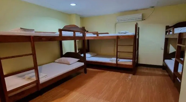 Кровать в общем номере Mojica Residencia Hotel
