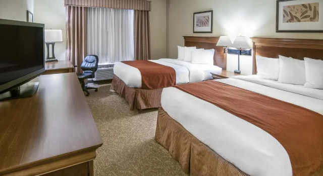 Четырёхместный номер Standard Country Inn & Suites by Radisson, Rapid City, SD