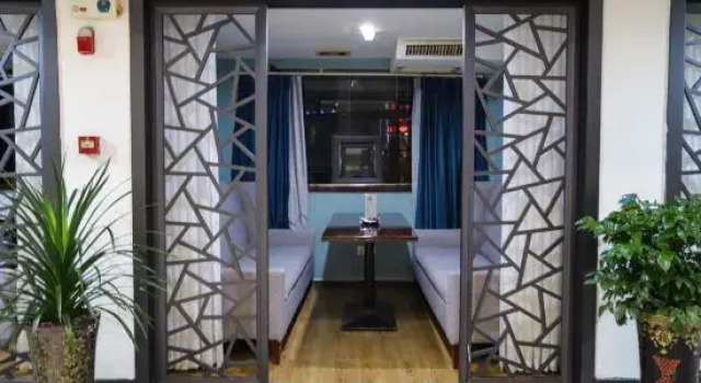 Manzhou Hotel (Yongshun Yinhe Branch), Забронировать Отель Юншунь Хунань