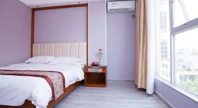 Люкс Deluxe Minghao Business Hotel