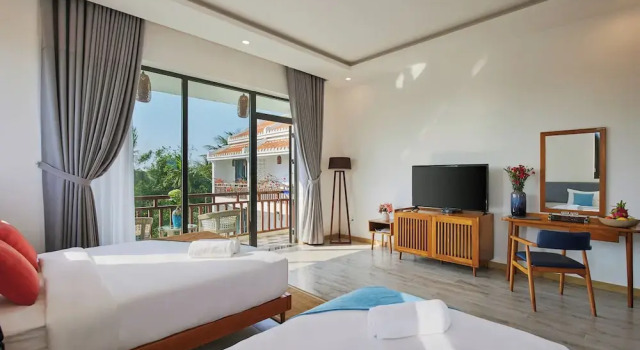 Трёхместный номер Deluxe с балконом и с красивым видом из окна Chieu Ha Village Riverside - Hoi An