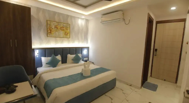 Номер Comfort Treebo Premium Paarth Grand with Pure Veg Restaurant