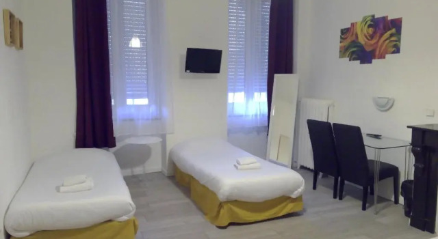 Standardowy czteroosobowy pokój Hôtel Central