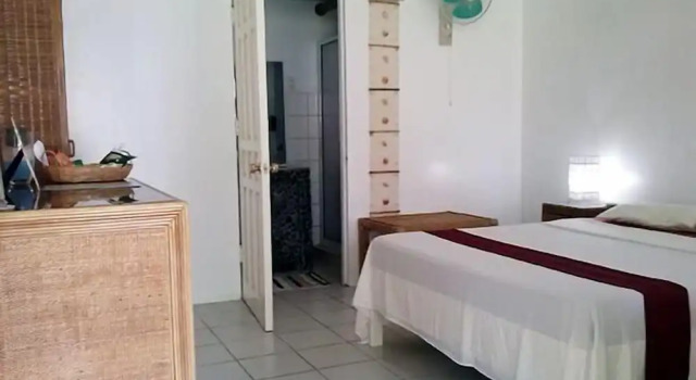 Номер Deluxe Whispering Palms Island Resort
