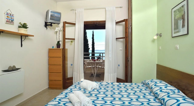 Captain's Apts Barbati, Забронировать Отель Барбати 