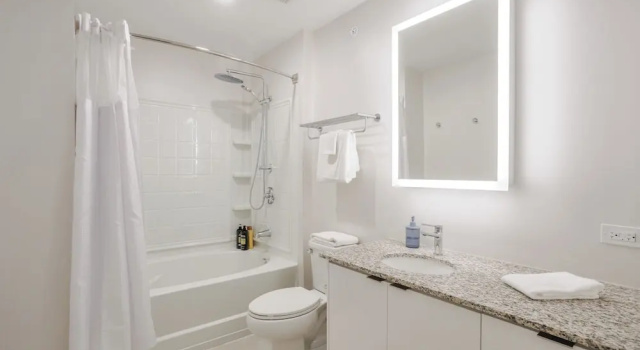 Апартаменты Deluxe CozySuites - Sky Central