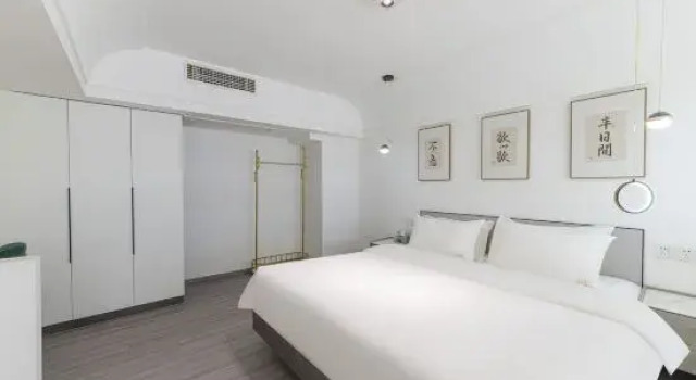 Люкс Deluxe First Glance Huixin Homestay (Wende Road Subway Station Branch), Pukou