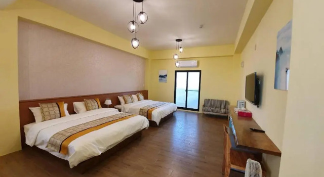 Camera quadrupla Standard con balcone Clare Holiday B&B