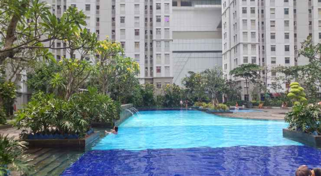 Best 2BR Green Bay Pluit Apartment By Travelio, Prenota Appartamento Hotel a Giacarta con piscina, Piscina