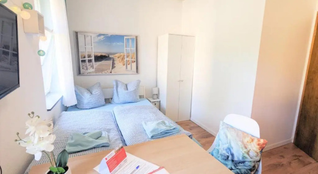 Апартаменты Helle gemütliche Wohnung mit Terrasse und Pool - H2