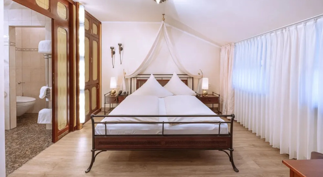 Четырёхместный люкс Hotel Neuwirt