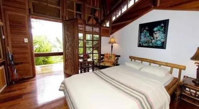 Кровать в общем номере Aguila de Osa Rainforest & Marine Adventure Lodge