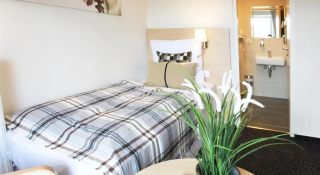 Кровать в общем номере Sleephotels