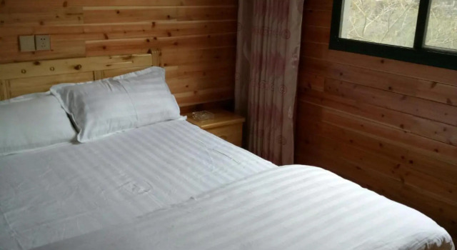 Jiuhuangshan Chengcheng Homestay, Varaa Hotelli Hotellit Sichuan pysäköinnillä, Pysäköinti