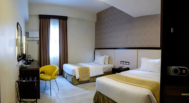 Номер Deluxe One Central Hotel & Suites