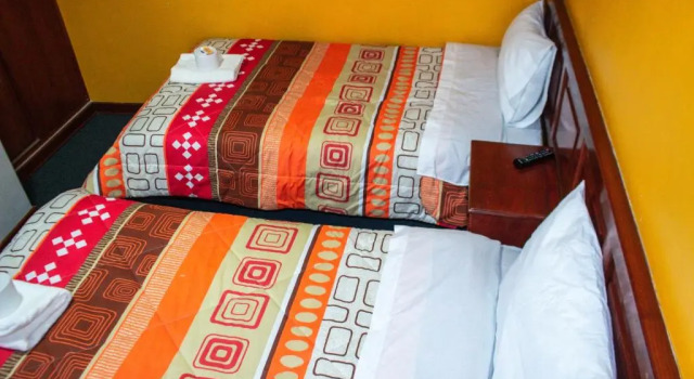 Кровать в общем номере Huaraz Center Hostal