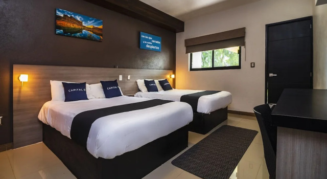 Четырёхместный номер Standard с балконом Collection O Hotel Mango,Six Flags Hurricane Harbor Oaxtepec