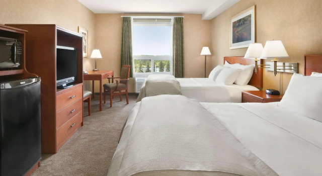 Четырёхместный номер Standard Days Inn & Suites by Wyndham Cochrane