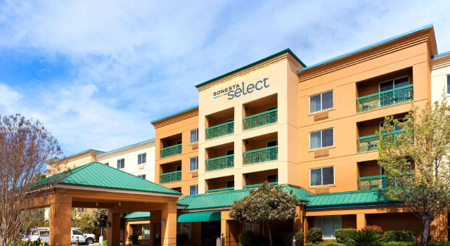 Кровать в общем номере Sonesta Select San Ramon