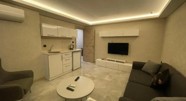 Апартаменты c 1 комнатой Le Luxe Suites Hotel
