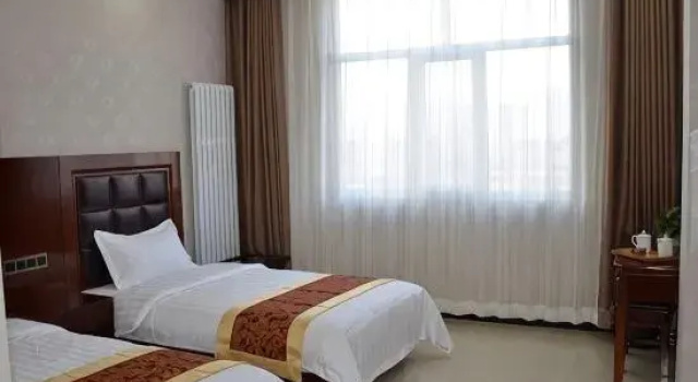 Номер Economy Kaiyuan Business Hotel