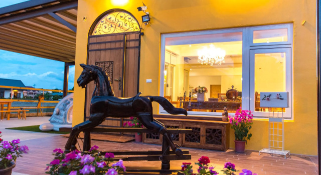colorful wooden horse homestay