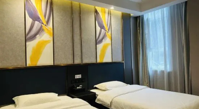 Кровать в общем номере Beiting Hotel Dushanzi District