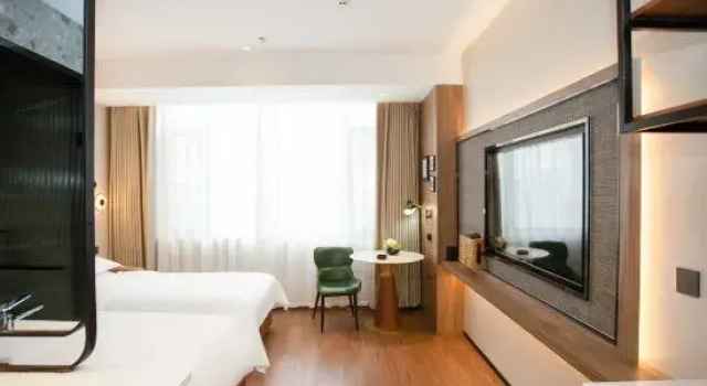 Кровать в общем номере Qingyang Anpo Hotel
