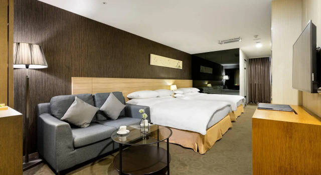 Deluxe Neljän hengen huone Beacon Hotel