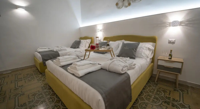 Четырёхместный номер Luxury Dimora Fantasia Charme B&B