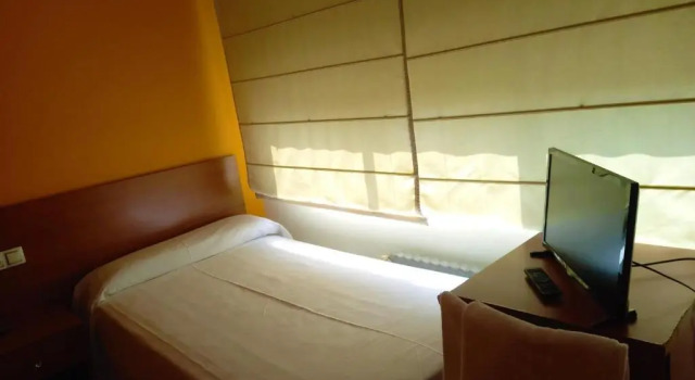 Номер Standard Pension San Roque