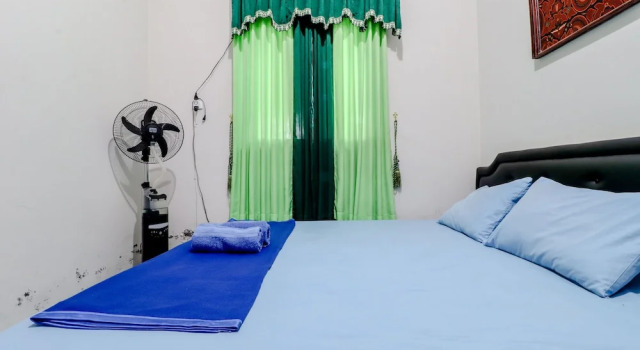 Номер Superior Homestay Damandiri Prambanan Syariah