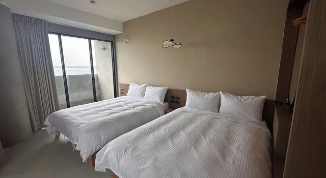 Camera quadrupla Deluxe con vista sull'oceano SomeWhere Inn