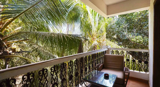 Кровать в общем номере The Camelot Beach Resort