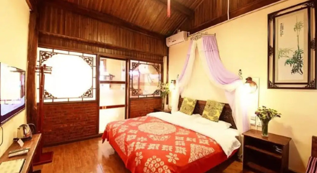 Номер Deluxe Lijiang shuimuxiquan Inn