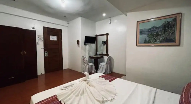 Кровать в общем номере Casa Lorenzo powered by Cocotel