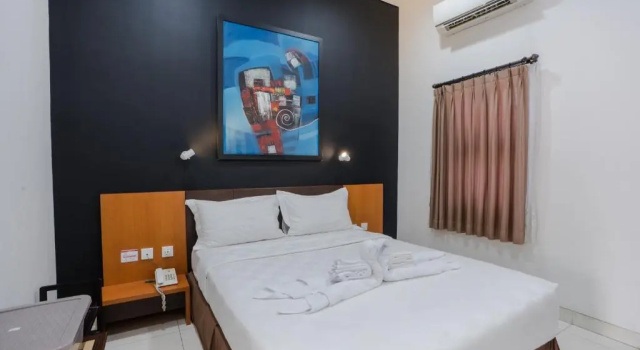 Номер Deluxe Jambuluwuk Heritage Menteng Suites