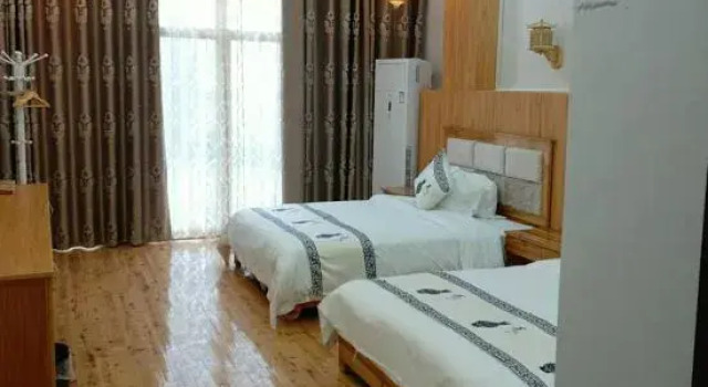 Люкс Enshi Happy Sunday Vacation Apartment