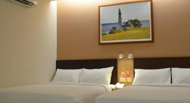 Четырёхместный семейный номер Standard Hotel Asia