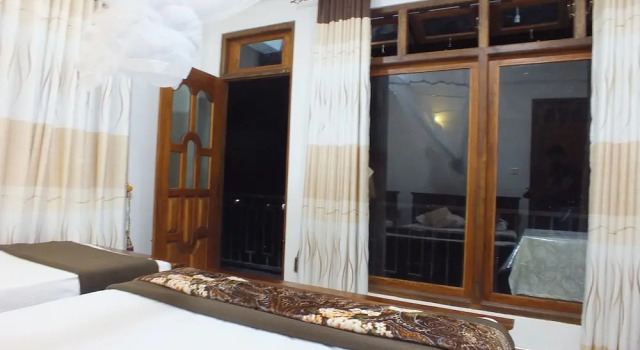 Трёхместный номер Deluxe c 1 комнатой с балконом и с видом на окрестности Senasuma Inn Ella