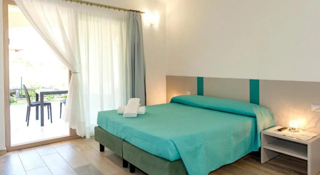 MOLAROTTO CAMERE CON ANGOLO COTTURA, Buchen Sie Hotel Hotels in San Teodoro mit Pool, Schwimmbad