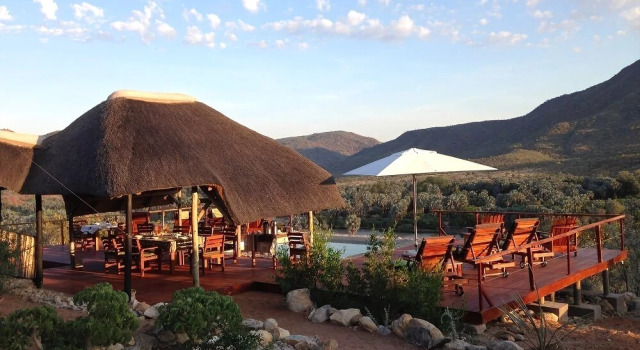 Kapika Waterfall Camp, Boek Hotel Epupa Namibië, in de buurt van Epupa falls