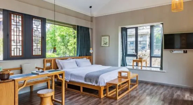 Кровать в общем номере Floral Hotel · Chengdu Hou Zhai You Zhu Hotel