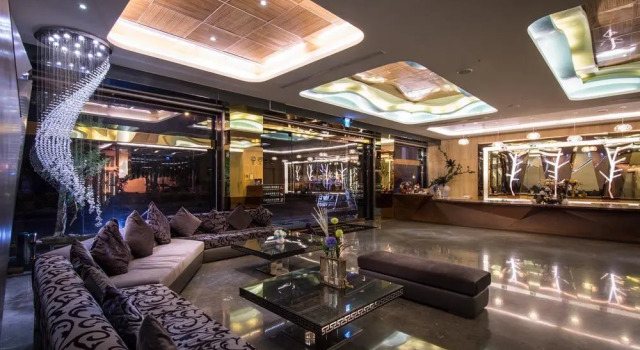 Кровать в общем номере Shianghu Boutique Hotel